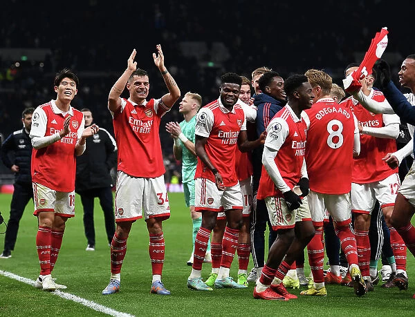 Granit Xhaka Celebrates with Arsenal Fans: Tottenham vs Arsenal, Premier League 2022-23