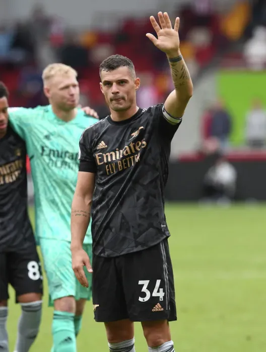 Framed Print : Granit Xhaka Celebrates Arsenal's Win at Brentford Community Stadium