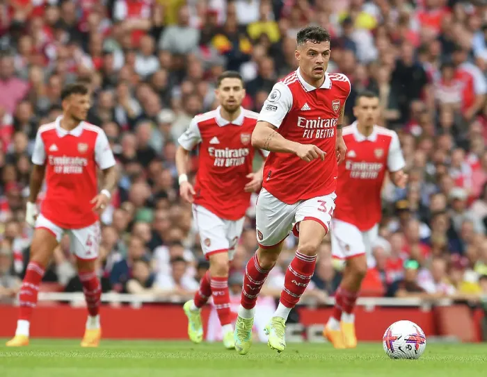 Framed Print : Granit Xhaka Charges Forward: Arsenal vs Brighton & Hove Albion, Premier League 2022-23
