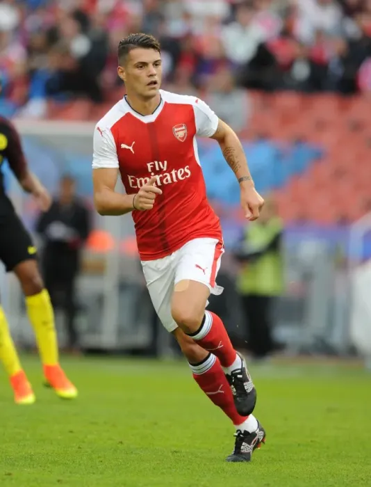 Framed Print : Granit Xhaka Faces Manchester City: Arsenal's Star Midfielder in 2016 Pre-Season Clash