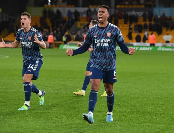 Framed Print : Granit Xhaka and Gabriel's Jubilant Moment: Arsenal's Win Against Wolverhampton Wanderers in the Premier League