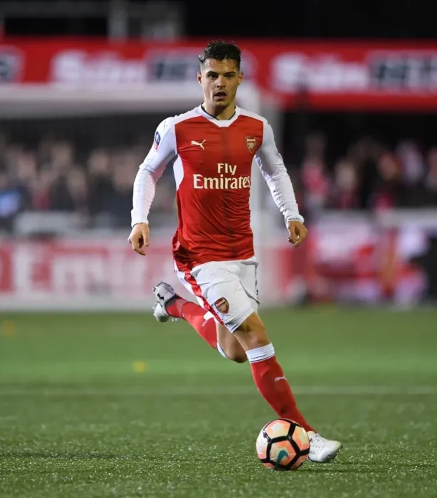Framed Print : Granit Xhaka Leads Arsenal in FA Cup Battle against Sutton United
