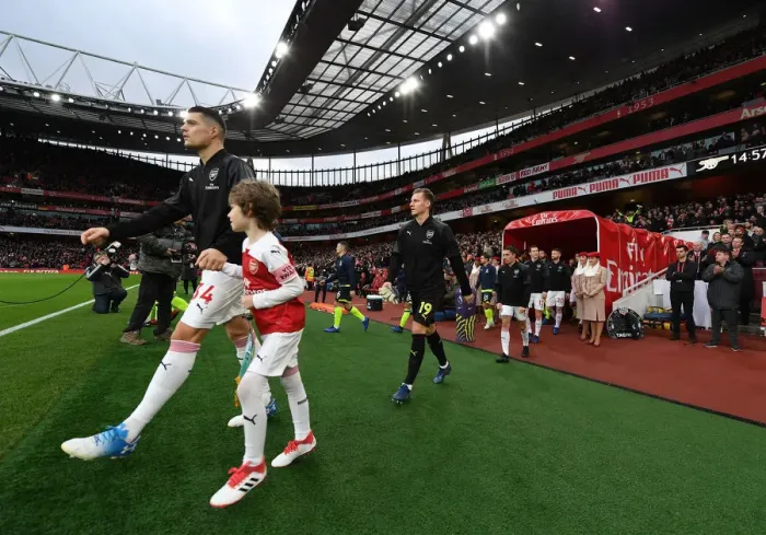 Framed Print : Granit Xhaka Leads Arsenal Out against Huddersfield Town, Premier League 2018-19 Framed Print : Granit Xhaka Leads Arsenal Out against Huddersfield Town, Premier League 2018-19