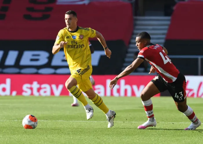 Framed Print : Granit Xhaka Overpowers Yan Valery: Arsenal's Victory Moment at Southampton, Premier League 2019-2020 Framed Print : Granit Xhaka Overpowers Yan Valery: Arsenal's Victory Moment at Southampton, Premier League 2019-2020