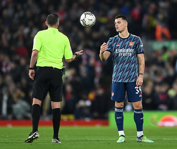 Granit Xhaka Passes to Referee Oliver in Carabao Cup Semi-Final Clash: Liverpool vs Arsenal (2021-2022)