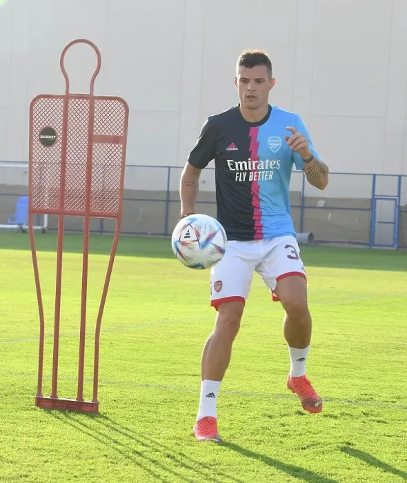 Framed Print : Granit Xhaka Prepares for Arsenal vs AC Milan: Arsenal FC Training Session, Dubai Super Cup 2022