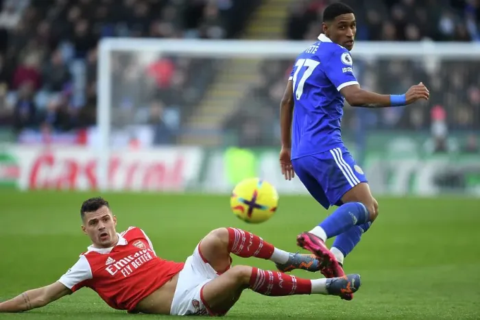 Framed Print : Granit Xhaka Tackles Tete in Intense Leicester City vs. Arsenal FC Clash, Premier League 2022-23
