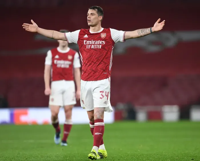 Framed Print : Granit Xhaka in UEFA Europa League Action: Arsenal vs. Olympiacos (Behind Closed Doors, 2021)