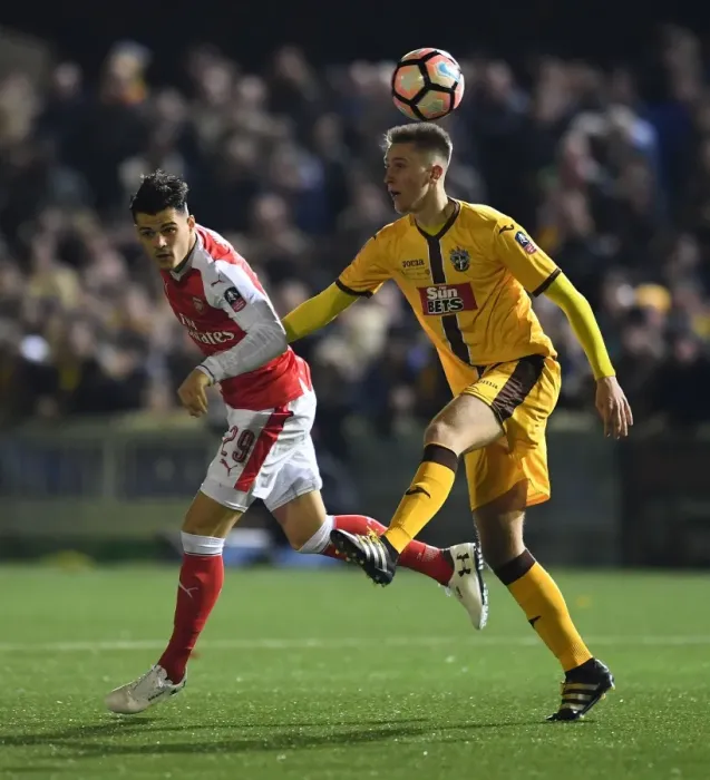 Framed Print : Granit Xhaka vs. Adam May: A FA Cup Battle at Sutton United
