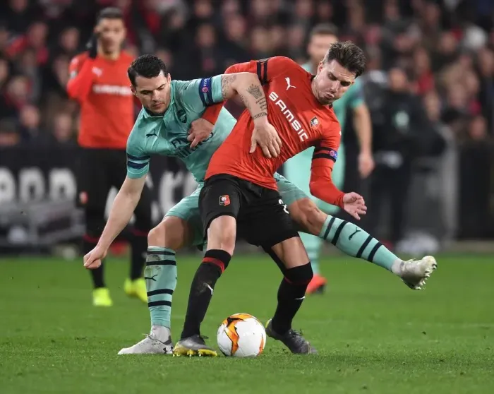 Framed Print : Granit Xhaka vs. Adrien Hunou: Clash in the UEFA Europa League as Arsenal Face Stade Rennais