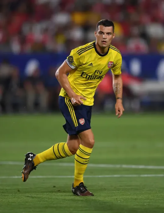 Framed Print : Granit Xhaka vs Bayern Munich: Arsenal's Midfield Battle in 2019 US Pre-Season Clash