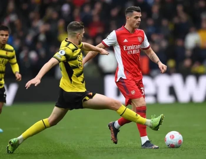 Framed Print : Granit Xhaka vs Craig Cathcart: Intense Battle in Watford v Arsenal Premier League Clash Framed Print : Granit Xhaka vs Craig Cathcart: Intense Battle in Watford v Arsenal Premier League Clash