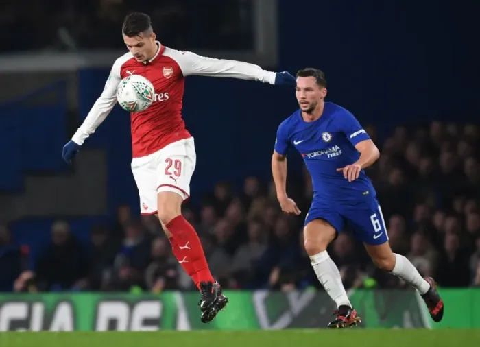 Framed Print : Granit Xhaka vs. Danny Drinkwater: Carabao Cup Semi-Final Showdown at Stamford Bridge Framed Print : Granit Xhaka vs. Danny Drinkwater: Carabao Cup Semi-Final Showdown at Stamford Bridge