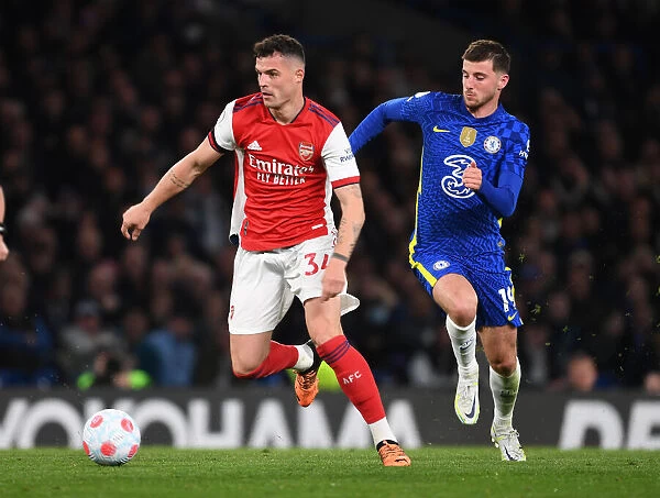 Granit Xhaka vs. Mason Mount: Battle in the Heart of the Premier League Clash between Chelsea and Arsenal