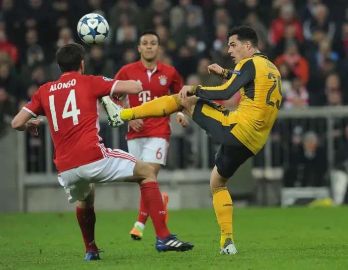 Framed Print : Granit Xhaka vs. Xabi Alonso: Battle in the Midfield - Arsenal vs. Bayern Munich, UEFA Champions League 2016-17