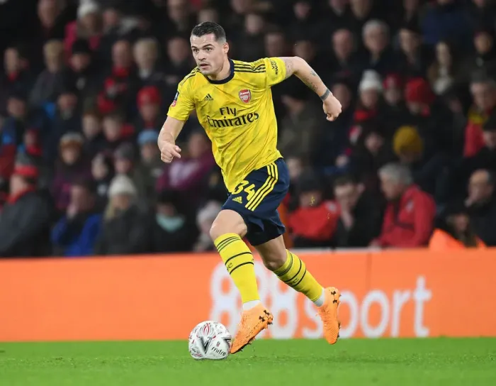 Framed Print : Granit Xhaka's Brilliant Midfield Display: Arsenal Advances in FA Cup with Victory Over AFC Bournemouth Framed Print : Granit Xhaka's Brilliant Midfield Display: Arsenal Advances in FA Cup with Victory Over AFC Bournemouth