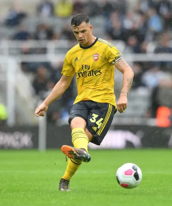 Framed Print : Granit Xhaka's Brilliant Midfield Performance: Arsenal Triumphs Over Newcastle United