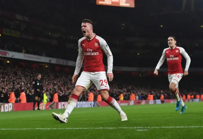 Framed Print : Granit Xhaka's Double Strike: Arsenal's Dramatic Comeback vs. Liverpool (2017-18)