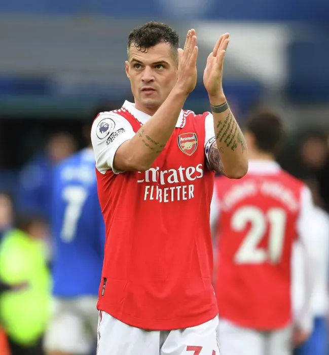 Framed Print : Granit Xhaka's Emotional Applause: Everton vs. Arsenal, Premier League 2022-23 - A Heartfelt Moment at Goodison Park
