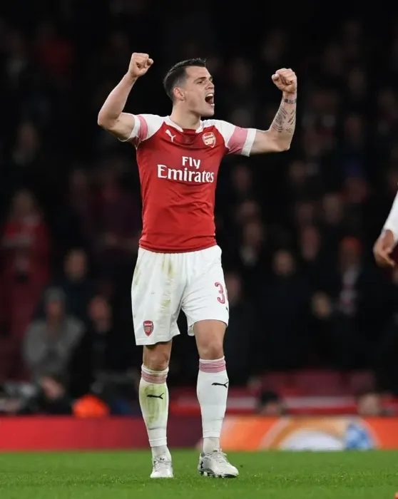 Framed Print : Granit Xhaka's Emotional Europa League Triumph: Arsenal Secures Victory over Stade Rennais