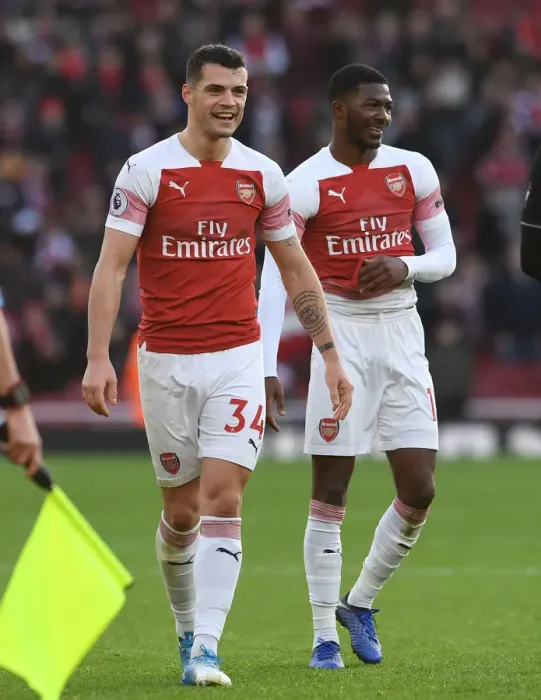 Framed Print : Granit Xhaka's Emotional Moment After Arsenal's Victory Over Burnley
