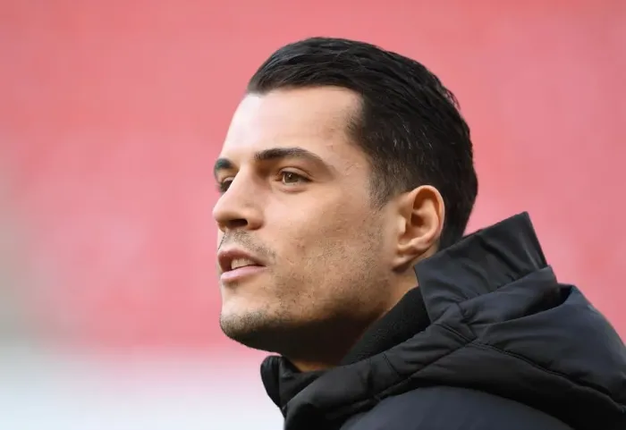 Framed Print : Granit Xhaka's Focus: Arsenal's Europa League Battle at Stade Rennais