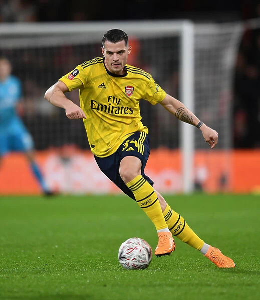 Granit Xhaka's Midfield Masterclass: Arsenal's Victory over AFC Bournemouth in the FA Cup