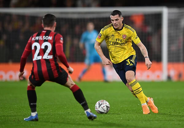 Granit Xhaka's Midfield Masterclass: Arsenal Advances in FA Cup with Win Against AFC Bournemouth