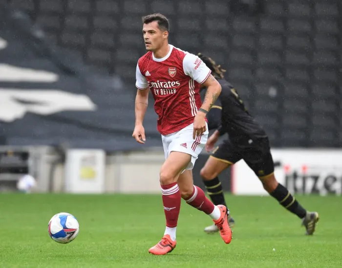 Framed Print : Granit Xhaka's Pre-Season Dominance: Arsenal's Victory over MK Dons (2020-21) Framed Print : Granit Xhaka's Pre-Season Dominance: Arsenal's Victory over MK Dons (2020-21)