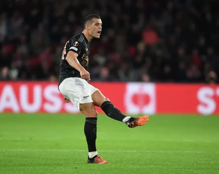 Framed Print : Granit Xhaka's Standout Midfield Display: Arsenal's Dominant Performance against PSV Eindhoven in Europa League