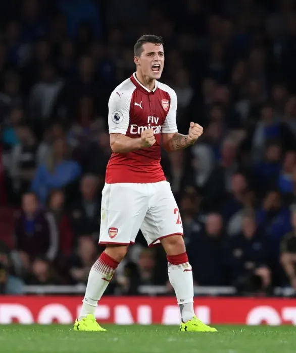 Framed Print : Granit Xhaka's Triumph: Arsenal's Victory Celebration vs. Leicester City, 2017-18 Premier League Framed Print : Granit Xhaka's Triumph: Arsenal's Victory Celebration vs. Leicester City, 2017-18 Premier League