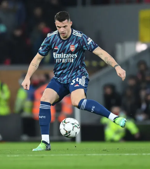 Framed Print : Granit Xhaka's Unwavering Focus: Arsenal's Midfield Maestro in Carabao Cup Battle Against Liverpool Framed Print : Granit Xhaka's Unwavering Focus: Arsenal's Midfield Maestro in Carabao Cup Battle Against Liverpool