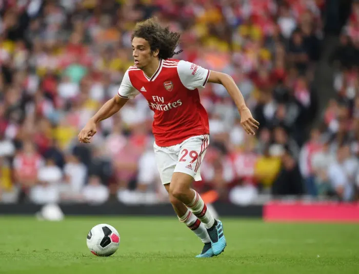 Framed Print : Guendouzi in Action: Arsenal vs. Tottenham at the Emirates Stadium (Premier League 2019-20)