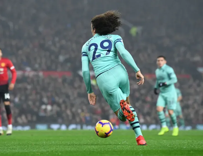 Framed Print : Guendouzi at Old Trafford: A Premier League Battle between Arsenal and Manchester United (2018-19) Framed Print : Guendouzi at Old Trafford: A Premier League Battle between Arsenal and Manchester United (2018-19)