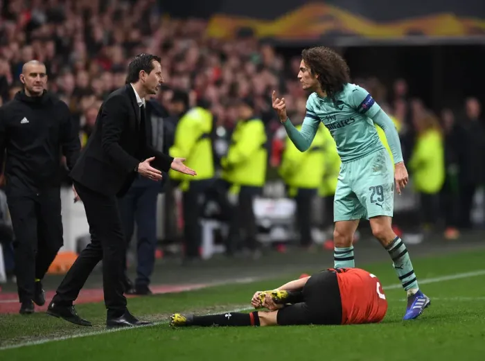 Framed Print : Guendouzi and Stephane: A Moment of Respite Amidst Europa League Tensions (Stade Rennes vs Arsenal, 2018-19) Framed Print : Guendouzi and Stephane: A Moment of Respite Amidst Europa League Tensions (Stade Rennes vs Arsenal, 2018-19)