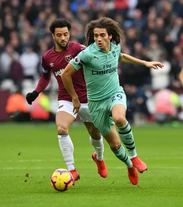 Framed Print : Guendouzi vs. Anderson: Battle in the Premier League - West Ham United vs. Arsenal FC Framed Print : Guendouzi vs. Anderson: Battle in the Premier League - West Ham United vs. Arsenal FC