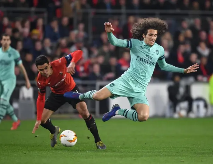 Framed Print : Guendouzi vs. Andre: A Midfield Battle in Arsenal's Europa League Clash with Rennes
