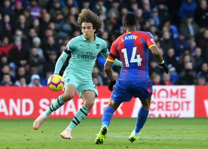 Framed Print : Guendouzi vs Ayew: Intense Battle in Crystal Palace vs Arsenal FC Premier League Clash Framed Print : Guendouzi vs Ayew: Intense Battle in Crystal Palace vs Arsenal FC Premier League Clash