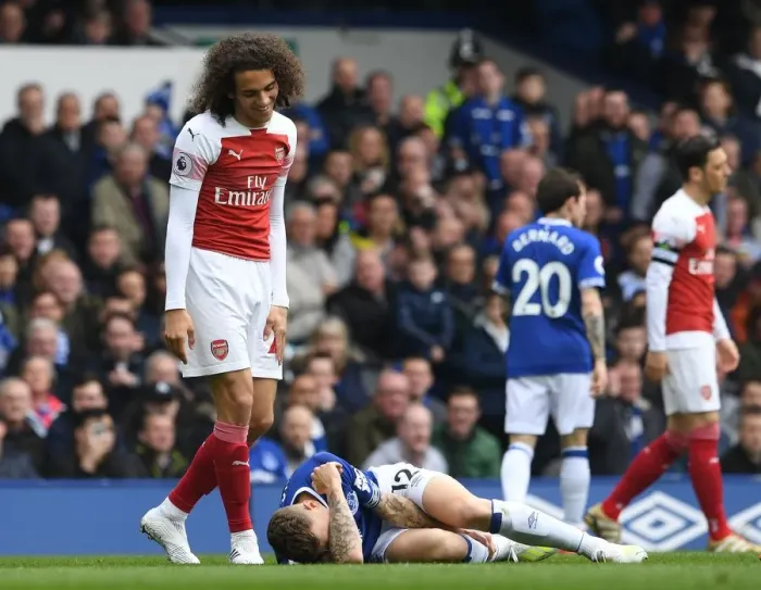Framed Print : Guendouzi vs. Digne: A Battle of Will in the Premier League Clash between Everton and Arsenal