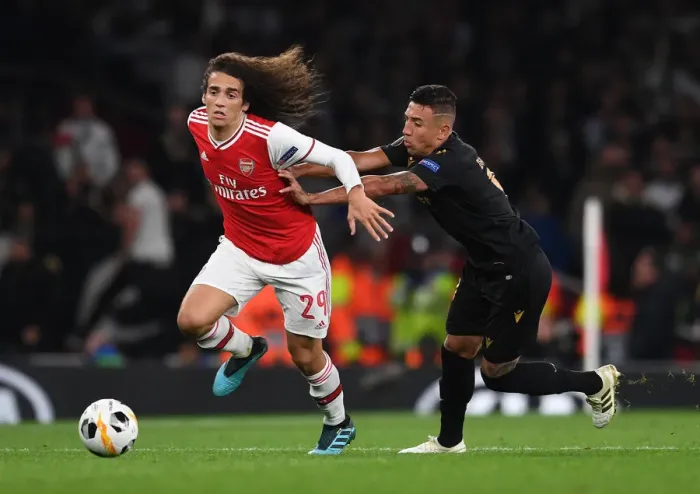 Framed Print : Guendouzi vs. Duarte: A Battle in Arsenal's Europa League Clash against Vitoria Guimaraes Framed Print : Guendouzi vs. Duarte: A Battle in Arsenal's Europa League Clash against Vitoria Guimaraes