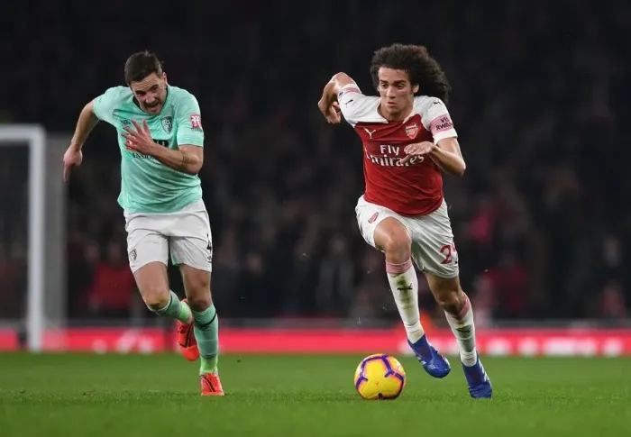 Framed Print : Guendouzi vs. Gosling: A Premier League Battle at Emirates Stadium Framed Print : Guendouzi vs. Gosling: A Premier League Battle at Emirates Stadium