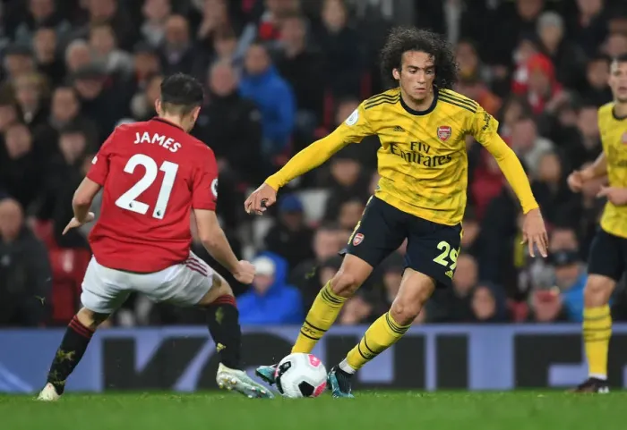 Framed Print : Guendouzi vs James: Battle at Old Trafford - Manchester United vs Arsenal FC, Premier League 2019-20