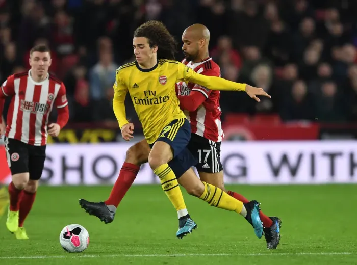 Framed Print : Guendouzi vs McGoldrick: Intense Battle at Sheffield United vs Arsenal, Premier League 2019-20 Framed Print : Guendouzi vs McGoldrick: Intense Battle at Sheffield United vs Arsenal, Premier League 2019-20