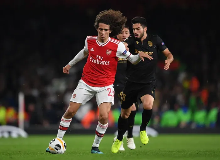 Framed Print : Guendouzi vs. Pepe: Clash of the Europa League Titans at Arsenal's Emirates Stadium