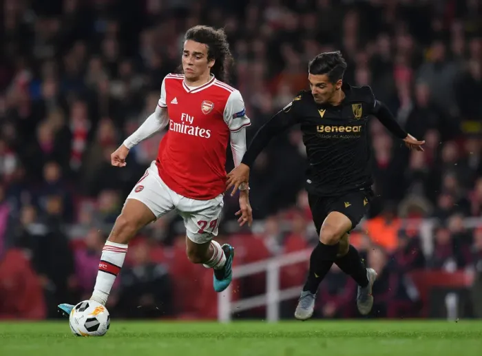 Framed Print : Guendouzi vs. Rochinha: A Battle in Arsenal's Europa League Clash against Vitoria Guimaraes Framed Print : Guendouzi vs. Rochinha: A Battle in Arsenal's Europa League Clash against Vitoria Guimaraes