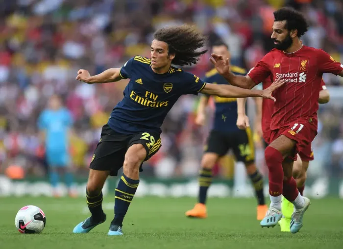 Framed Print : Guendouzi vs. Salah: Liverpool vs. Arsenal Clash in Premier League (2019-20) Framed Print : Guendouzi vs. Salah: Liverpool vs. Arsenal Clash in Premier League (2019-20)