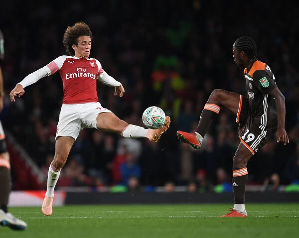 Guendouzi vs. Sawyers: Intense Battle in Arsenal's Carabao Cup Clash against Brentford