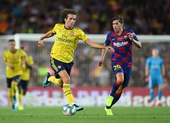 Framed Print : Guendouzi vs. Sergi Roberto: FC Barcelona vs. Arsenal Pre-Season Clash at Nou Camp (2019) Framed Print : Guendouzi vs. Sergi Roberto: FC Barcelona vs. Arsenal Pre-Season Clash at Nou Camp (2019)