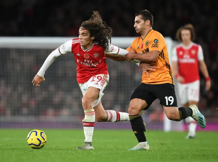 Framed Print : Guendouzi's Midfield Magic: Arsenal Outwit Wolves Framed Print : Guendouzi's Midfield Magic: Arsenal Outwit Wolves
