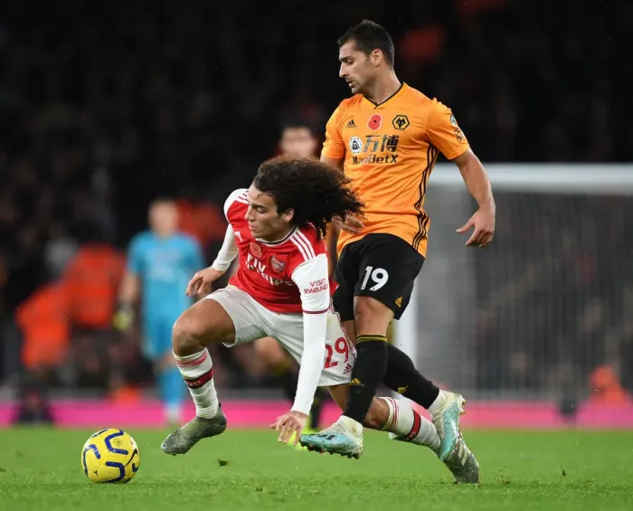 Framed Print : Guendouzi's Slick Move: Arsenal Edge Past Wolves in Premier League Thriller Framed Print : Guendouzi's Slick Move: Arsenal Edge Past Wolves in Premier League Thriller